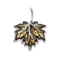 Sterling Silver Pendant Elegant amber maple leaf which has undergone a specialist carving and pressure treatment to create a dramatic, realistic effect.