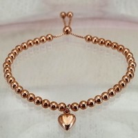 Sterling Silver Bracelet Rose gold-plated bead slider with heart charm