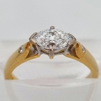 Pre-Owned 18ct Yellow/White Gold 0.57ct Brilliant Cut Marquise Diamond Ring With a Further Two Diamonds Situated on the Shoulders