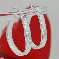 Sterling Silver Polished Greek key  creole hoop Earrings.